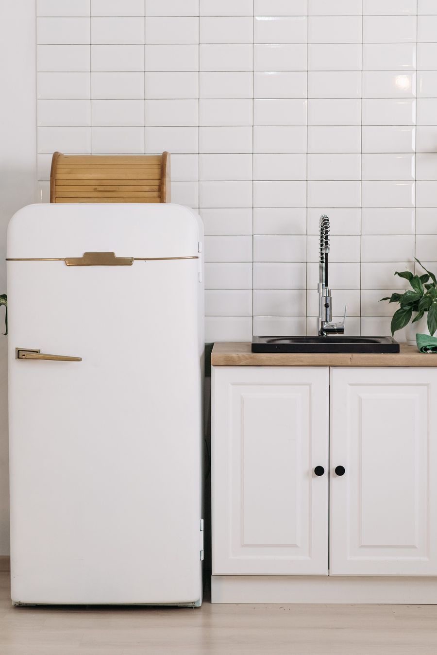 A fridge in a kitchen, ready to be collected for licensed WEEE recycling