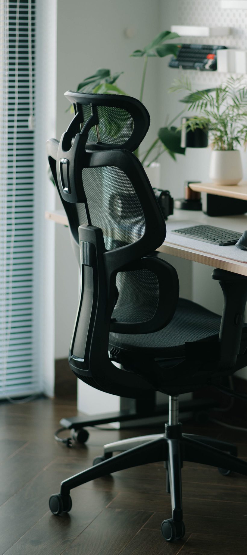 A mesh office chair on wheels, ready for collection